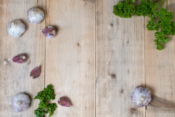 Fresh garlic on a wooden background