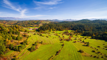 Aerial drone view of amazing autumn colors in fall landscape. Brkini, Slovenia - obrazy, fototapety, plakaty