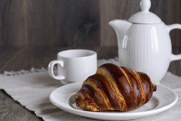 French breakfast with croissant and coffee