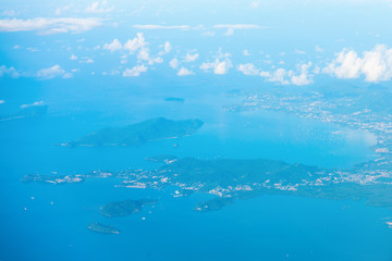 Aerial view of the tropical islands in blue sea water