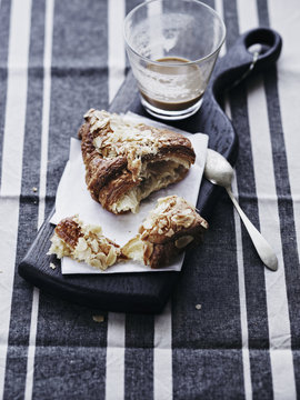 Twice-baked almond croissant with coffee