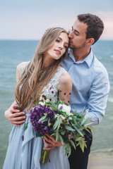 couple in love celebrating a wedding on the ocean