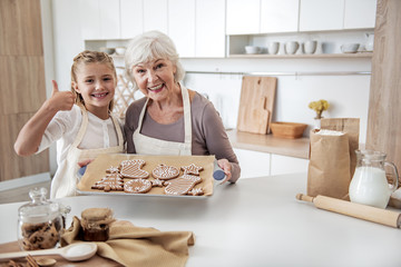 Cheerful family is satisfied with self-made sweets
