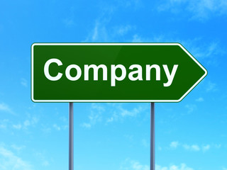 Business concept: Company on road sign background
