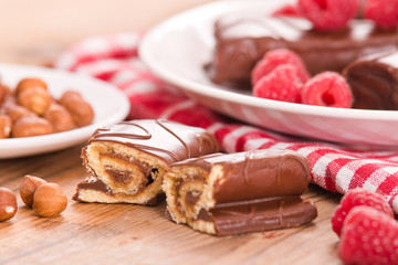 Chocolate rolls with hazelnuts and raspberries.