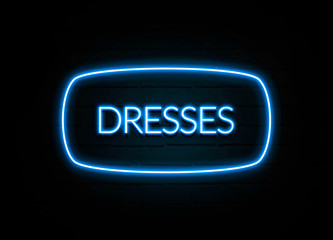 Dresses  - colorful Neon Sign on brickwall