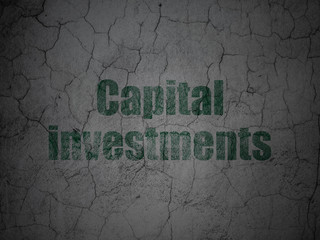 Banking concept: Capital Investments on grunge wall background