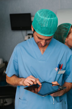Biologist Working in the Laboratory Using a Tablet