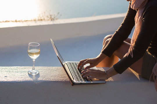 Woman Typing On Laptop