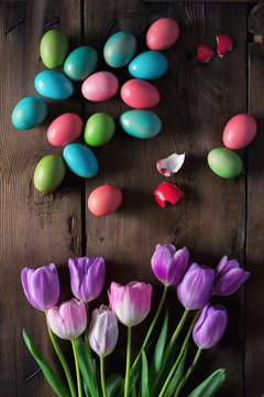 Pastel color Easter eggs and tulips