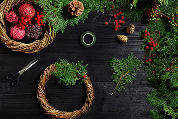 Manufacturer of Christmas decor with their own hands. Christmas wreath for the holiday. The new...