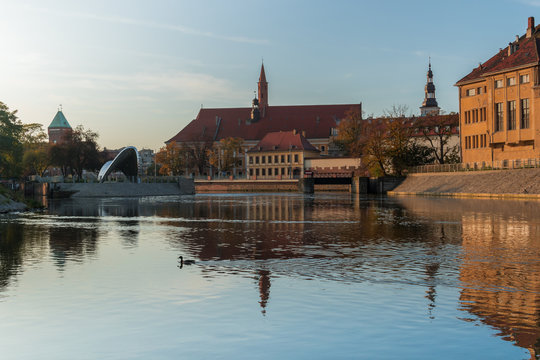 Tamka Island with reflections in the Odra river at dawn, Wroclaw, Poland