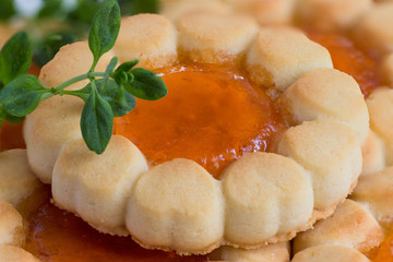 Biscuits with orange jam and thyme.