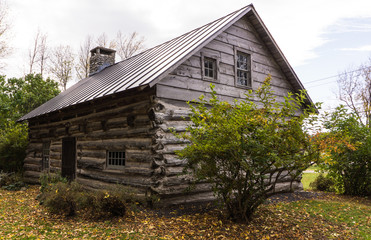 view of one of the oldest pioneer log cabins in the country in Vermont
