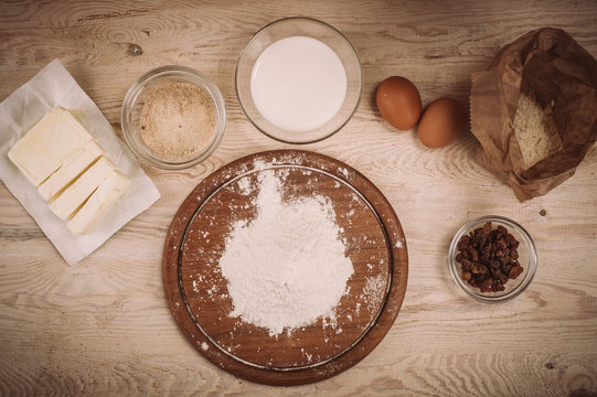 Dough recipe ingredients on vintage rural wood kitchen table