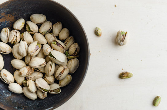 Bowl of salted Pistachios snack