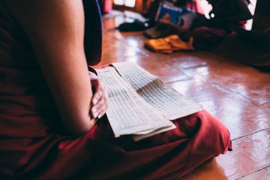 Monk reading Sutras in Lingshed monastery