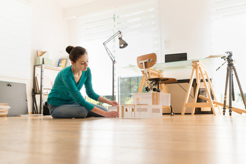 A woman architect working on a construction project at office