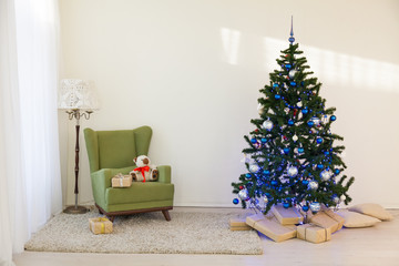 Christmas tree in a bright room new year gifts