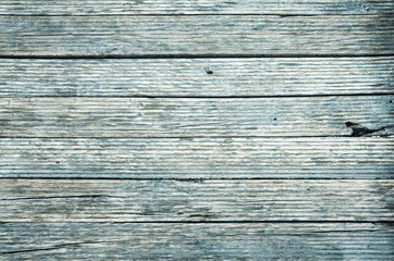 Wooden boards background, color toning applied.