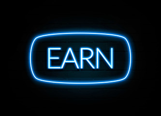 Earn  - colorful Neon Sign on brickwall