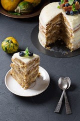 Pumpkin cake with cream cheese, vertical, selective focus
