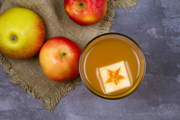Glass of cider. Apple cider and fruits. Apple drink, cocktail, beverage, juice. View from above, top studio shot, horizontal