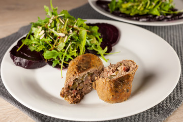 Dinner, beef roulades and salad with beets and rucola