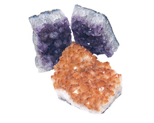 Citrine druzy cluster surrounded by amethyst druzy clusters  isolated on white background
