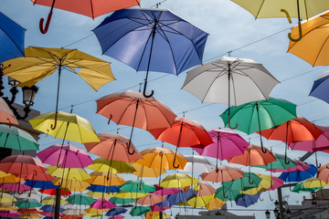 Obraz na płótnie Canvas colorful umbrellas in the sky