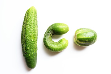 Different shape fresh cucumbers on white background