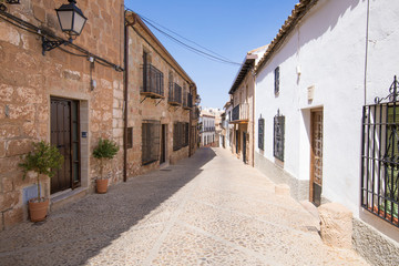 Fototapeta na wymiar landmark ancient street in old town of Banos de la Encina village, in Jaen, Andalusia, Spain Europe 