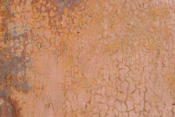 surface of rusty iron with remnants of old paint, chipped paint, beige texture, background