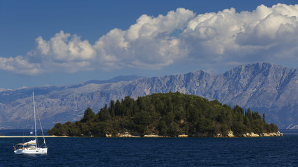 Sail boat at the coast of Skorpios island in Ionian sea, Greece.

