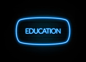 Education  - colorful Neon Sign on brickwall