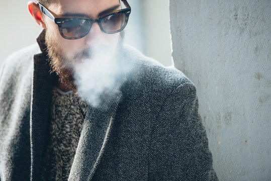 Cool Man With Beard Covered in Smoke