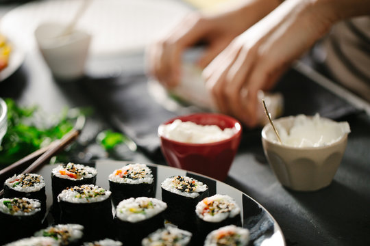Woman Making Spring Rolls