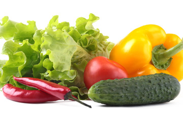 Assorted vegetables, fresh bell pepper, tomato, chilli pepper, cucumber and lettuce isolated on white background. Selective focus.