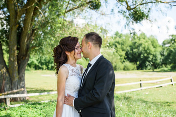 Portrait of a young couple. Wedding photo outdoor of loving couple