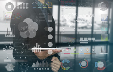 business hand holding tablet with data analysis diagram for finance.