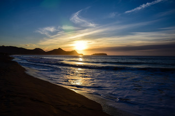 Sunrise over the headland of Porto Santo Island, north of Madeira, Portugal