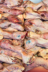 Chiken heads for sale on Asian market.