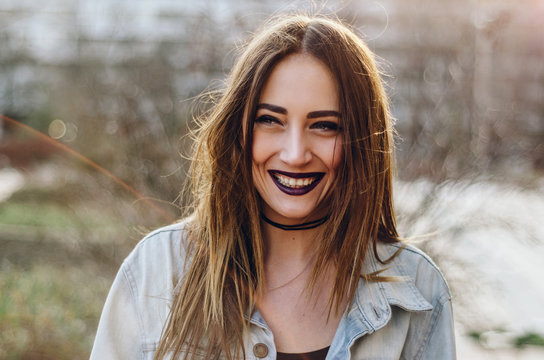 Portrait of a smiling alternative Woman.