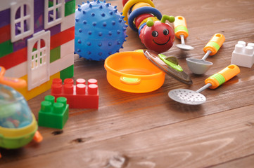 Different baby toys on a white background