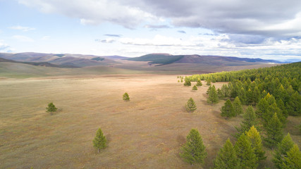Obraz premium Aerial view from a drone of a vast mountain landscape in northern Mongolia. Khuvsgol, Mongolia.