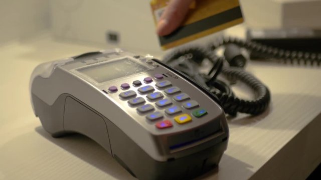 Click on the keyboard on the bank terminal, make purchases in the store. 3840x2160, 4K