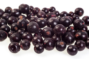 Black currant,frozen. Macro,frozen organic Black currant,a handful of sweet,luscious frozen Black currant isolated on white background,quick-frozen blackberry,healthy food.