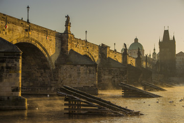 Beautiful morning in Prague. Prague at dawn in the autumn season. Charles bridge at foggy morning
