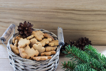 Christmas cookies, served in an old basket. Top view. Selective focus. Horizontal.