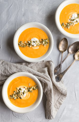 Squash soup on gray concrete background